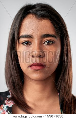 Portrait of real woman with no expression ID or passport photo full collection of diverse face and expressions