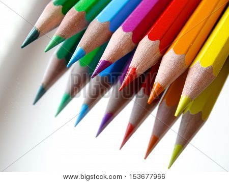 Colour pencils isolated on white background close up