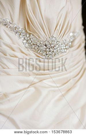 Beautiful wedding dress detail decoration close up