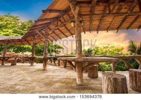 Wooden porch at the natural view point upon the mountain in sunset time