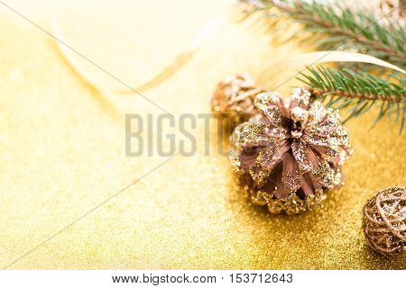 Christmas background. New year's Eve. 2017. Christmas tree, gold, cones, ornaments