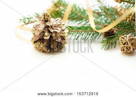 Christmas background. New year's Eve. 2017. tree, gold, cones, ornaments. White space place