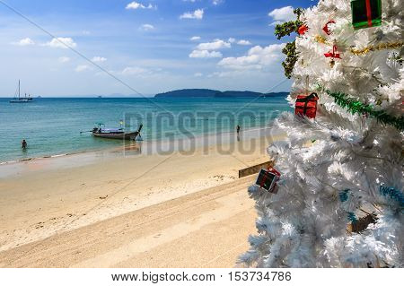 Ao Nang beach Thailand - December 25 2012: Christmas tree in front of Ao Nang beach on Christmas Day in Krabi Province southern Thailand