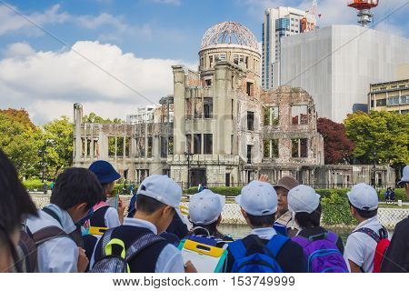 Hiroshima Japan - Nov 2 2015: Hiroshima atomic dome memorial Park with Japan student group visitor