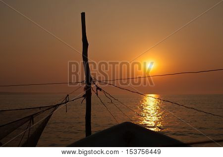 Detail of pillars and ropes fishing boats at dawn