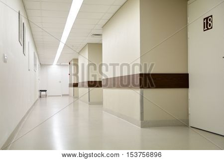 healthcare, medicine and ambulatory concept - empty hospital corridor