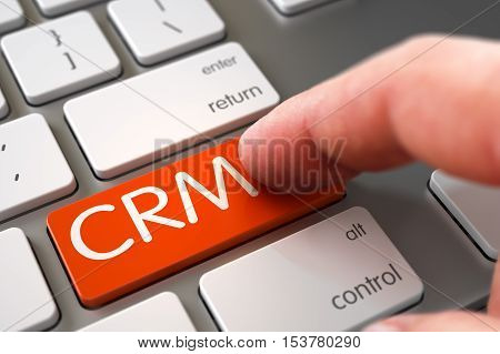 Man Finger Pressing Orange CRM Button on Aluminum Keyboard. 3D Render.