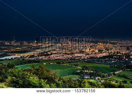 Beautiful view of skyline of Vienna and Danube River with green trees of Doebling district, Austria. Travel photo of the landmark.