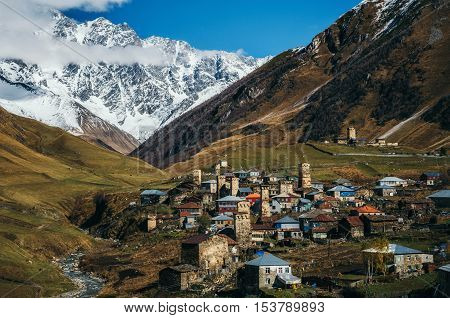 Svanetian Towers in Ushguli in autumn. One of the highest inhabited village in Europe. Caucasus Upper Svaneti Georgia.. UNESCO World Heritage Site.