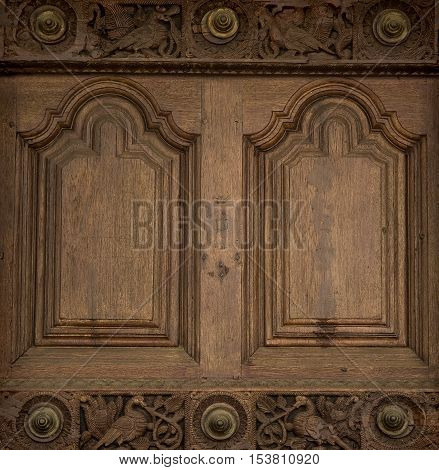 Antique old door made of wood with ornament