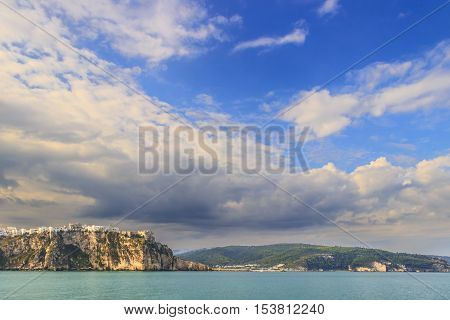 Apulia coast: Gargano National Park, bay of Peschici.-ITALY- Panoramic view of the old town.