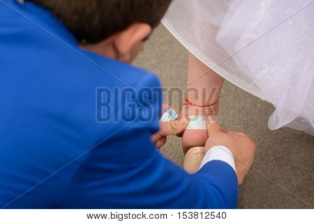gentleman helps a woman take care of her