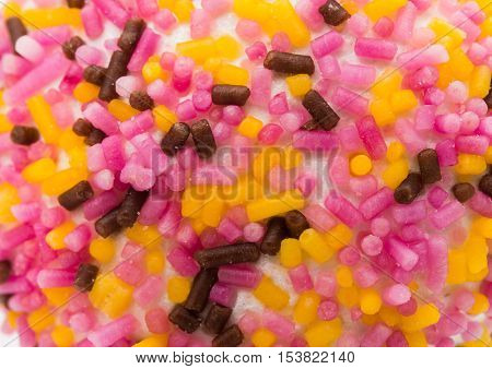 Sugar sprinkle dots decoration for cake and bekery a lot of sprinkles as a background
