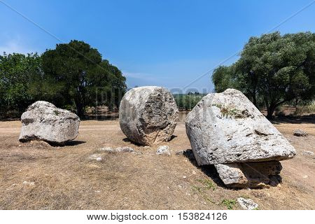 Cave di Cusa or Rocche di Cusa was an ancient stone quarry in Sicily. Its stone was used to construct the temples in the ancient Greek city Selinunte. The stone extraction was abandoned in 409 BC.
