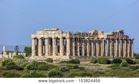 SELINUNTE ITALY - AUGUST 11 2016: Temple E (490-480 BC) in Selinunte thought to be dedicated to Hera considered to be one of the finest examples of Doric architecture in Sicily.