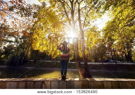 Woman Near The Tree At Autumn Park