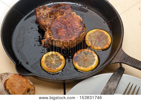 Pork Chop Seared On Iron Skillet