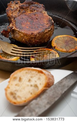 Pork Chop Seared On Iron Skillet