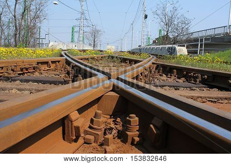 Closeup of the crossing railway tracks at a junction