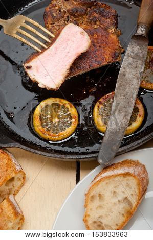 Pork Chop Seared On Iron Skillet