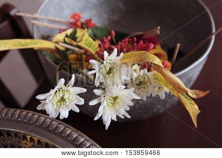 flowers in banana leaf cone to buddhist worship