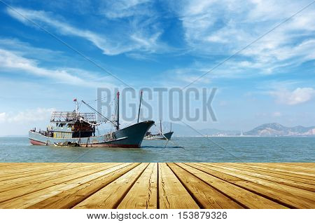 Blue sky and sea and fishing boats