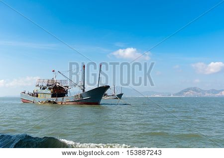 Blue sky and sea and fishing boats