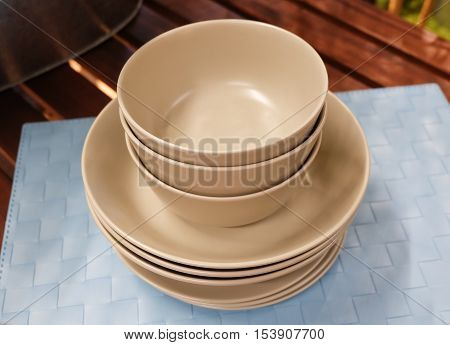 Kitchen Utensil Set of Brown Porcelain Dishes Bowls and Plates Preparing for Serve Hot and Cold Food.