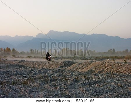 Motorcyclist on the road - Italy road