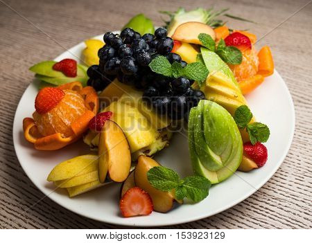 Slices Of Fresh Fruit With Grapes