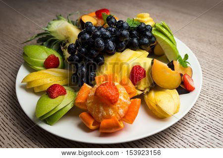 Slices Of Fresh Fruit With Grapes