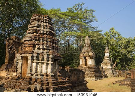 On the ruins of the ancient temple Wat Chedi Chet Thaye. Si-Satchanalai, Thailand