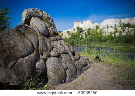 Ancient stone on a background of Voronezh Grand Canyon 