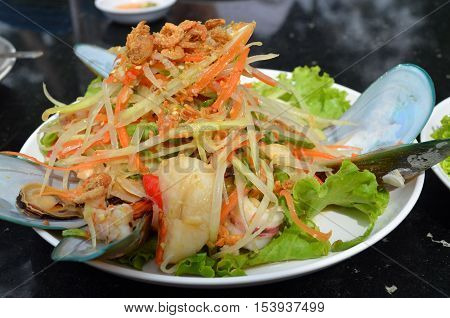 Delicious and spicy seafood papaya salad - Thai cuisine