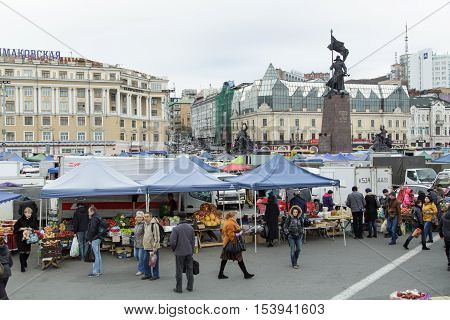 Vladivostok Russia - October 21th 2016: Vladivostok trading numbers on a central square of Vladivostok with a monument to Fighters for the power of Councils in the Far East.
