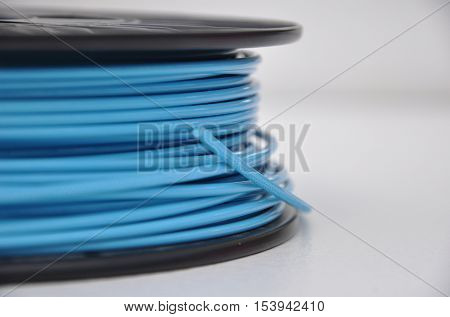 Blue coloured 3d printing filament plastic spool