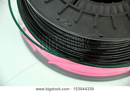 Pink and dark green 3d printing filament