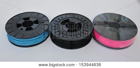 3d printing plastic filament spools in different colours