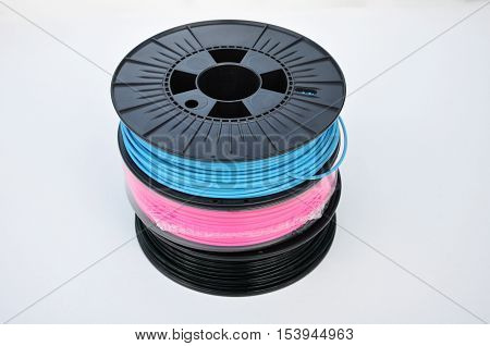 3d printing filament spools stacked on top of each other