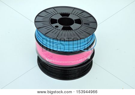3D printing filament spools stacked on top of each other
