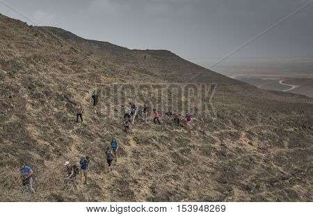 Salalah Oman July 10th 2015: hikers in the mountains of Dhofar in Salalah