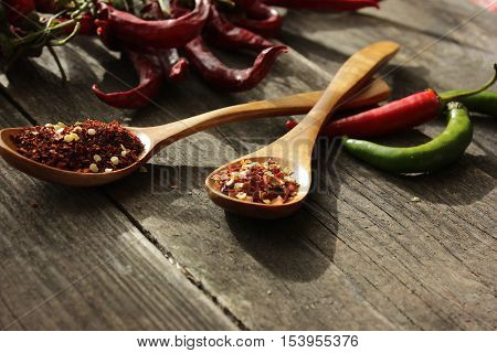 a handful of chili hot pepper on the table