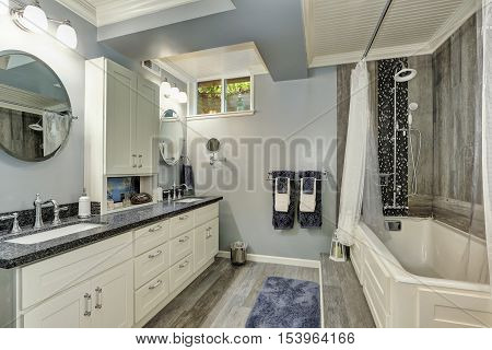Basement Bathroom Interior In Gray And White Tones