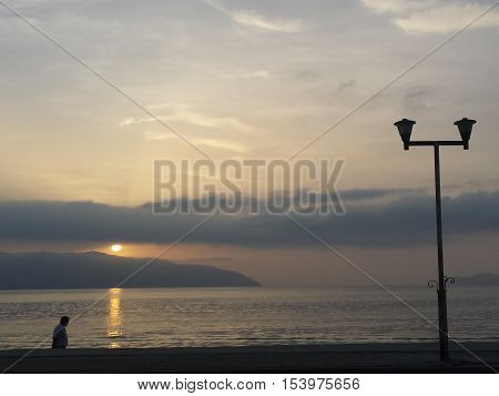 The sunset and the silence of the sea