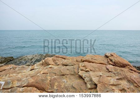 Scene of cliff with seascape view at Khao Laem Ya Mu Ko Samet National Park in the Gulf of Thailand.