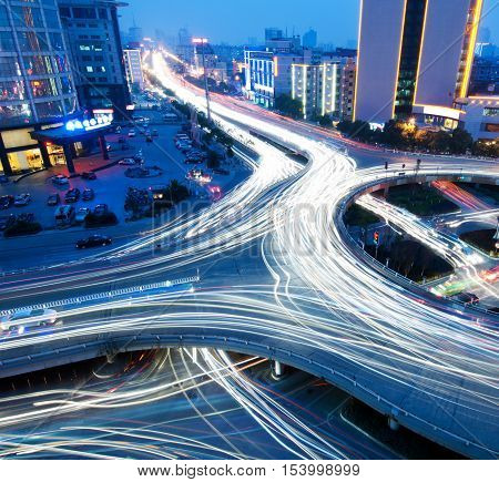 closeup of the light trails on grade separation bridge