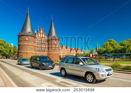 Lubeck - July 2018, Schleswig-holstein, Germany: View Of The Holsten Gate (holstentor) In The Old Ha