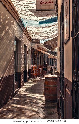 Malaga, Spain - August 09, 2018. Moreno Monroy Street With Restaurants From Old City Malaga, Costa D