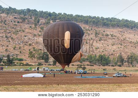 Afula, Israel, 3 August, 2018 : The Maintenance Team Inflates The Hot Air Balloon In The Shape Of He