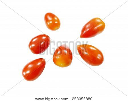 Top View Of Cherry Tomatoes Isolated On White Background (solanum Lycopersicum Var. Cerasiforme)